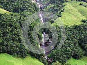 Waterfall Laubenfall in the Sernftal alpine valley or WasserfÃÂ¤lle LaubenfÃÂ¤lle photo