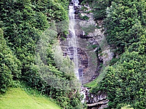 Waterfall Laubenfall in the Sernftal alpine valley or WasserfÃÂ¤lle LaubenfÃÂ¤lle photo