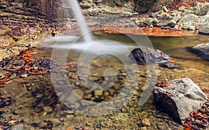 Waterfall. Leaves. Autumn. Forest. Water. Stone