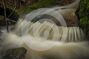 Waterfall on Lesni creek in Sumava national park in spring day