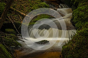 Waterfall on Lesni creek in Sumava national park in spring day