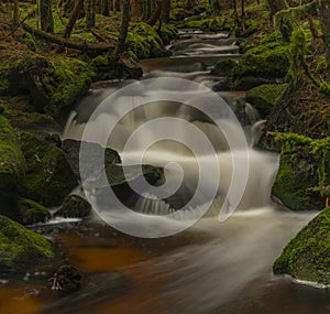 Waterfall on Lesni creek in Sumava national park in spring day