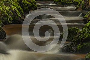 Waterfall on Lesni creek in Sumava national park in spring day