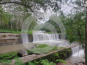 Waterfall is located not far from Mount Merapi in java in indonesia