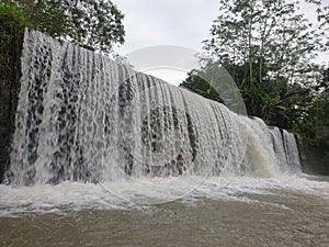 Waterfall is located not far from Mount Merapi in java in indonesia