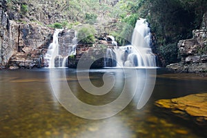 Waterfall with long exposure effect, Grito waterfall, sun trail, Capitolio Minas Gerais photo