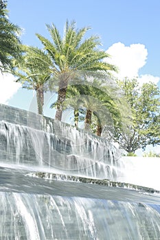 Waterfall long exposure fountain Palm trees