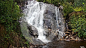 Waterfall with lush green surrounds