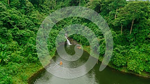 Waterfall in the middle of the forest. Bird eye view , drone