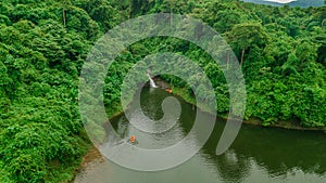 Waterfall in the middle of the forest. Bird eye view , drone