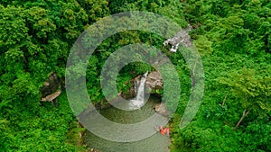 Waterfall in the middle of the forest. Bird eye view , drone