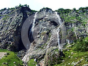 Waterfall Milchbachfall or Wasserfall MilchbachfÃ¤ll, MilchbÃ¤ch stream in the Alpine Valley of Maderanertal