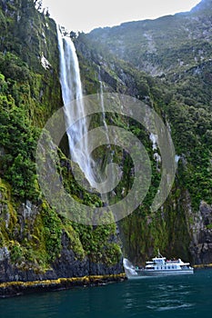 Waterfall in Milford Sound, Fjordland, New Zealand landscape