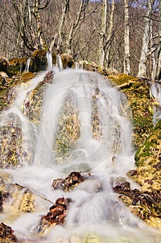 Waterfall on Mostenica travertines in the Uhliarska dolina Valley in Low Tatras mountains