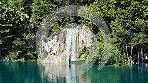 Waterfall and mountain, beautiful nature landscape, Plitvice Lakes in Croatia, National Park, sunny day