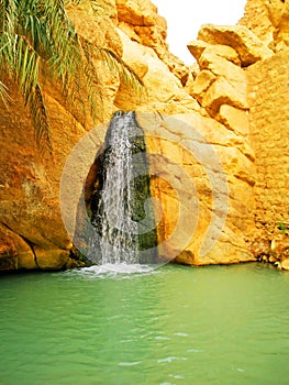 Waterfall in mountain oasis Chebika