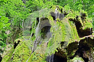 Waterfall at mountain river