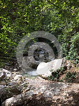 Waterfall and mountain river on the Botkin trail. Russia