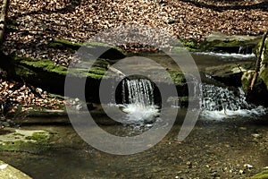 Waterfall on the mountain stream