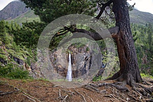 Waterfall. Mountain waterfall. Mountain river.