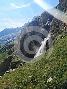 Waterfall in the mountains- Cervino Waterfall - Breuil-Cervinia, Italy