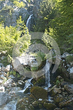 Waterfall in Theth mountains, Albania photo