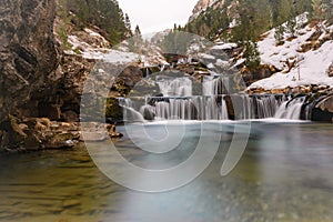 waterfall with the name of oaso steps in the natural park of ordesa in huesca in spain photo