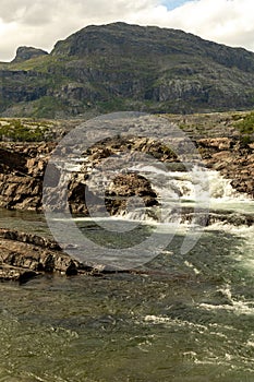 The waterfall in the national park Stora SjÃÂ¶fallet in Sweden. This is made near the Storasjofallet Mountain lodge. Made in the