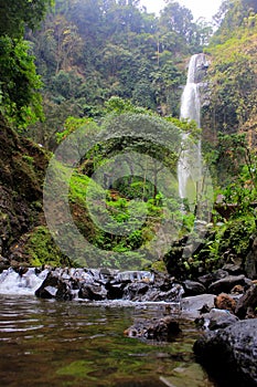 Waterfall nature curug cimahi bandung, indonesia - destination travel indonesia photo