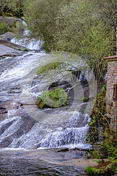 Waterfall in a nature park, located in Barro, Pontevedra (Spain)