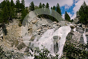 Waterfall on the Navisence river in Val d` Anniviers, Switzerland