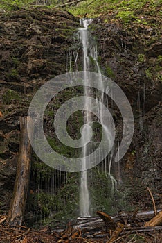 Waterfall near Kouty nad Desnou village in summer day