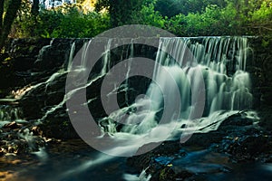 Waterfall near the river beach of Mamoa photo