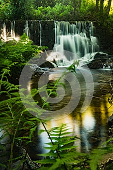 Waterfall near the river beach of Mamoa photo