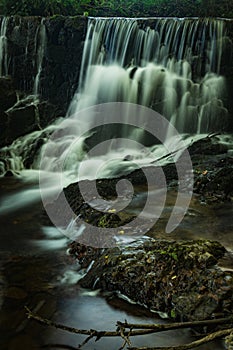 Waterfall near the river beach of Mamoa photo