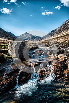 Waterfall Over Craggy Landscape In Isle Of Arran 