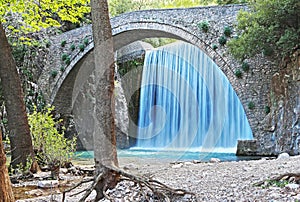 The waterfall of Palaiokaria in Trikala Thessaly Greece - stony arched bridge between the two waterfalls