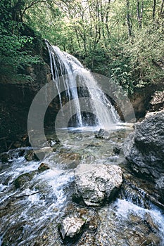 Waterfall in the park on the plateau in the Crimea