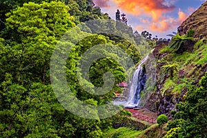 Waterfall at  Parque Natural Da Ribeira Dos Caldeiroes, Sao Miguel, Azores, Portugal. Beautiful waterfall surrounded with