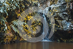 Waterfall at Parque Natural da Ribeira dos Caldeiroes, Sao Miguel, Azores, Portugal photo