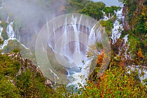 Waterfall the Plitvice Lakes in autumn