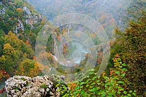 Waterfall the Plitvice Lakes in autumn