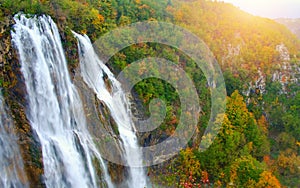 Waterfall the Plitvice Lakes in autumn