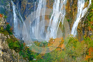 Waterfall the Plitvice Lakes at autumn