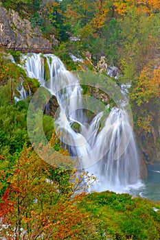 Waterfall the Plitvice Lakes at autumn