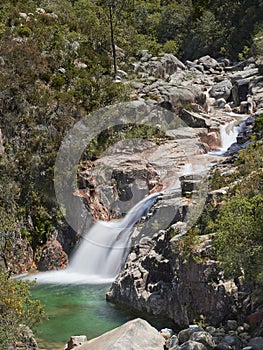 waterfall of portela do homem on a sunny day