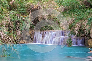 Waterfall in rain forest (Tat Kuang Si Waterfalls