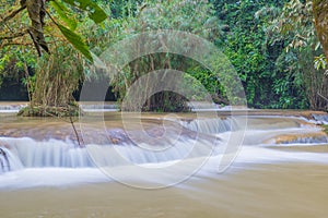 Waterfall in rain forest (Tat Kuang Si Waterfalls at Luang prabang, Laos)