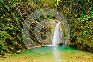 Waterfall in ravine Chudo-Krasotka, Sochi, Russia photo