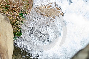 Waterfall from ravine.waterfall from the mountain river. rapid current